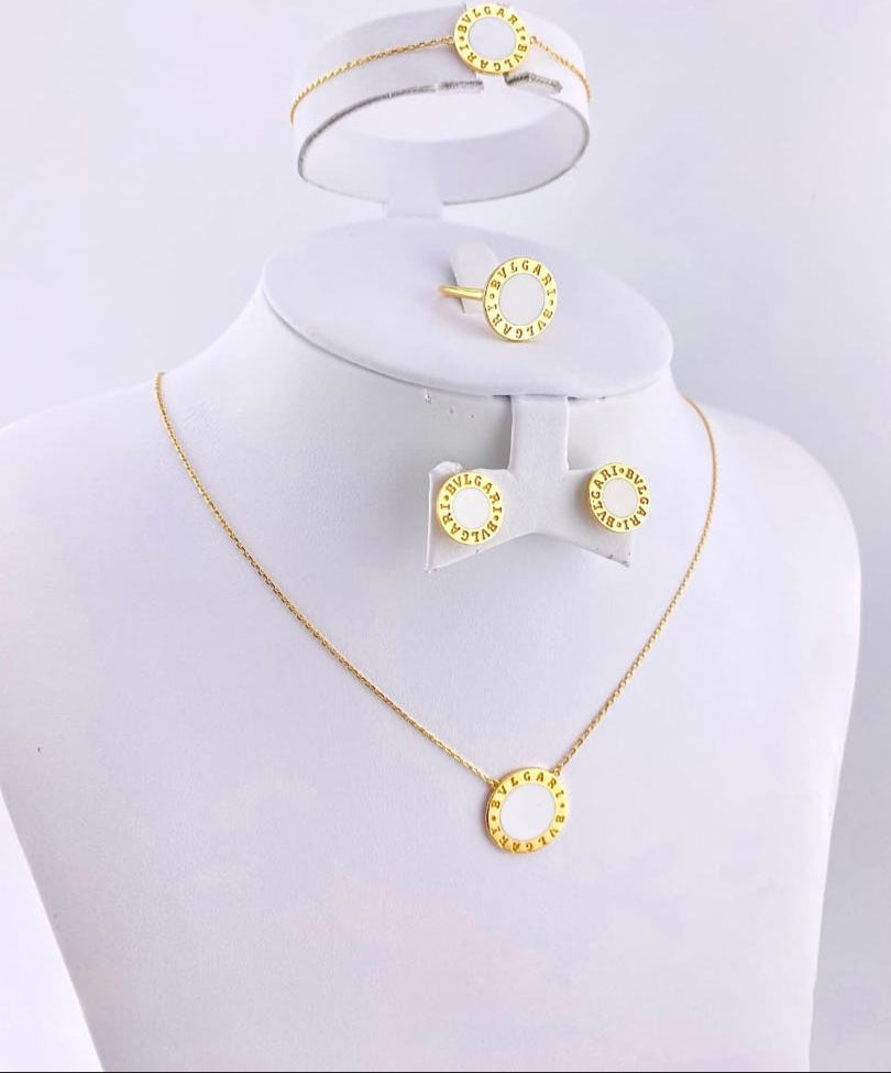 18 Carat Gold necklace, bracelet, earrings and ring